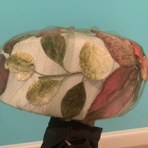 Jackie O vintage pillbox hat with flower appliqué and netting